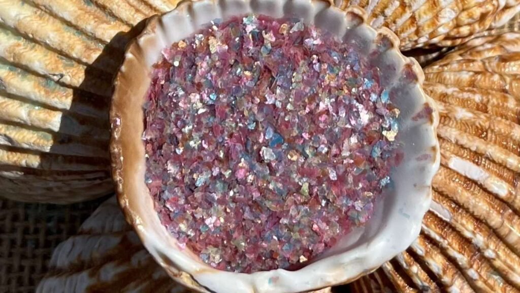 Purpurina rosa biodegradable de Marguli en concha